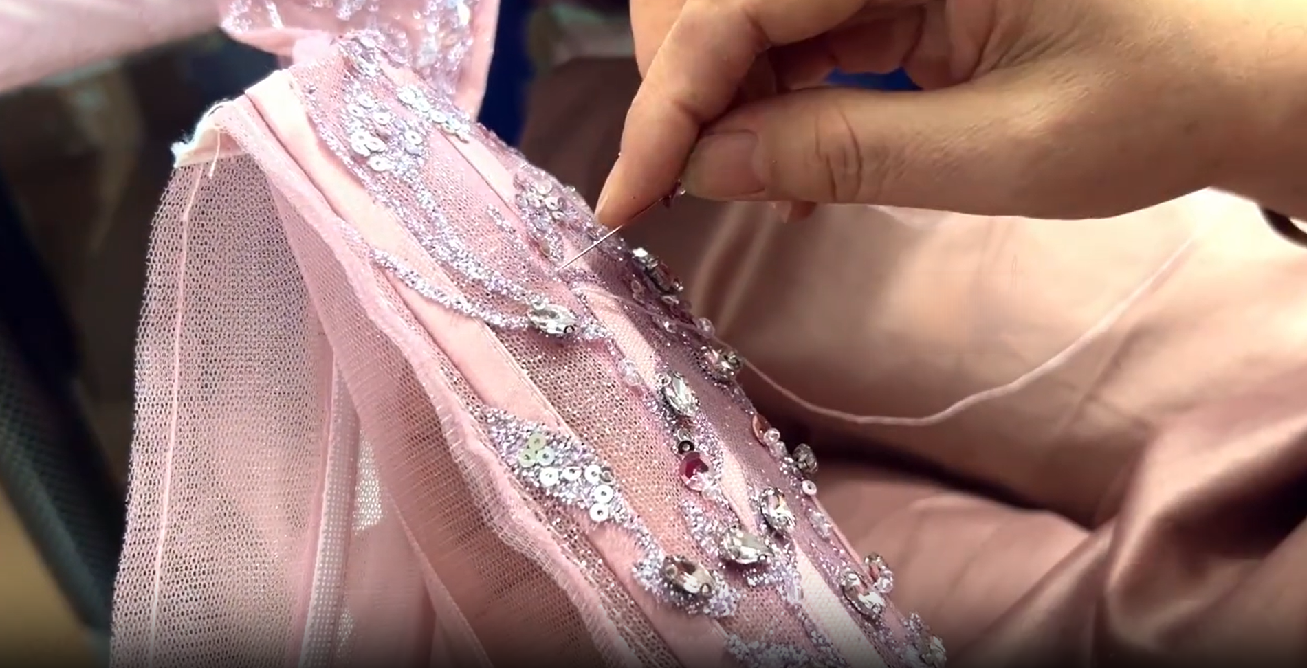 Beading station with crystals and sequins arranged by color