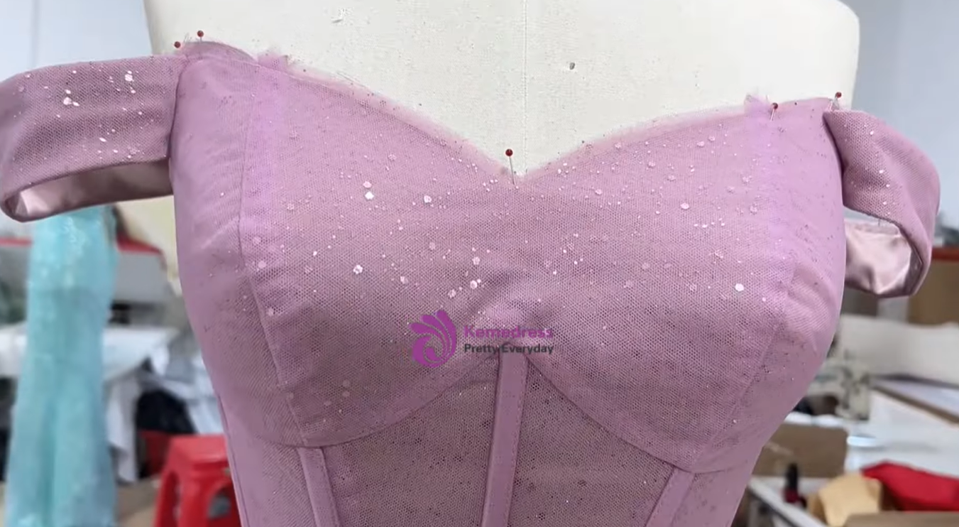 off shoulder neckline assembly for pink satin couture ball gown